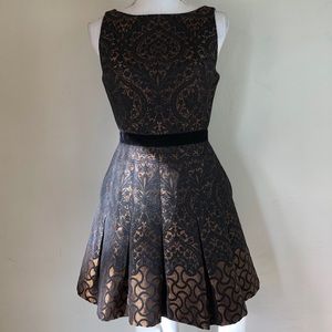 Bebe tapestry fit and flare holiday dress size 4